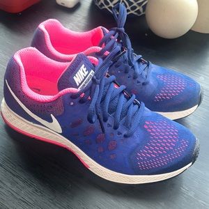 Blue and pink Nike running sneakers